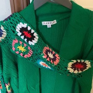 Cardigan with granny squares. Never worn.